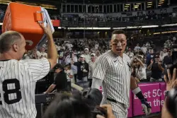 Yankees rally past Mariners 6-5 in 10 innings after going hitless against Bryan Woo until the 8th