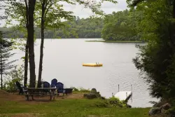 17-year-old charged with murder in paddleboarder’s killing at a pond in rural Maine